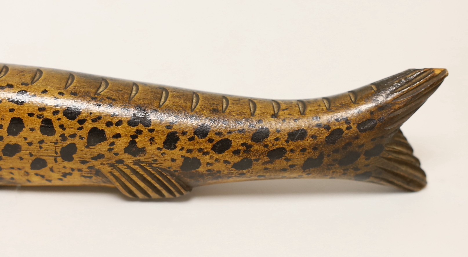 A 19th century treen flask with stopper, modelled as a rainbow trout, 26.5cm.